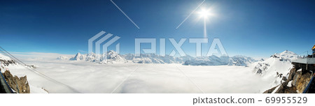 Stunning Panoramic view Snow moutain of the Swiss Skyline from Piz Gloria Schilthorn, Switzerland Stunning Panoramic view Snow moutain of the Swiss Skyline from Piz Gloria Schilthorn, Switzerland 69955529