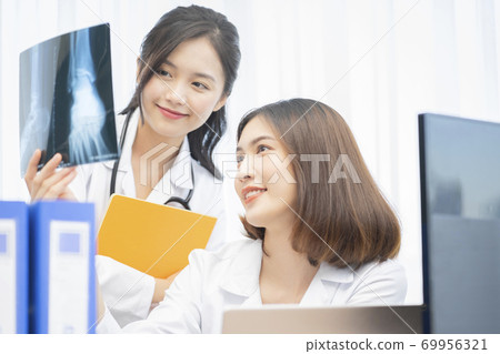 Female doctor work Female doctor work 69956321