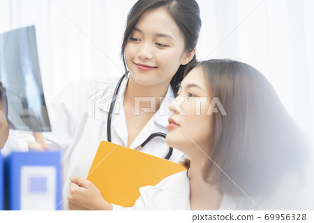 Female doctor work Female doctor work 69956328
