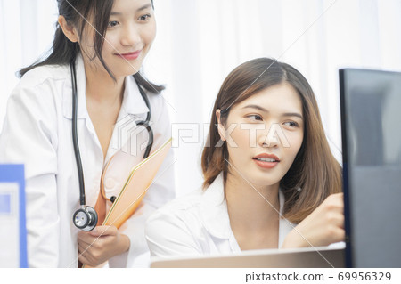 Female doctor work Female doctor work 69956329