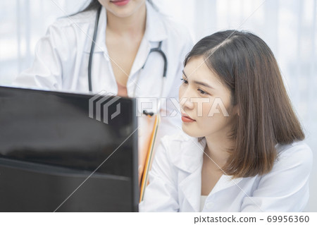 Female doctor work Female doctor work 69956360