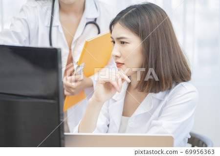 Female doctor work Female doctor work 69956363