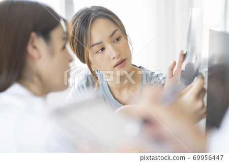 Female doctor work Female doctor work 69956447
