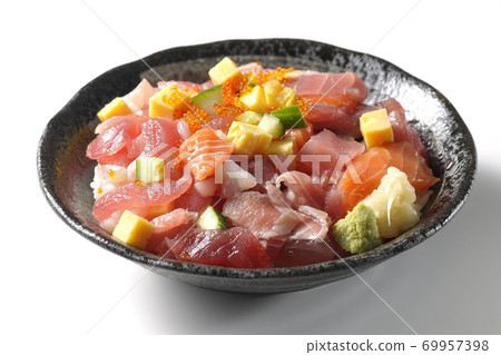 Seafood bowl with tuna, salmon, cucumber and tobiko (white background) Seafood bowl with tuna, salmon, cucumber and tobiko (white background) 69957398