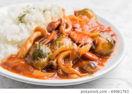 Stewed wieners and vegetables in tomato sauce Stewed wieners and vegetables in tomato sauce 69961763