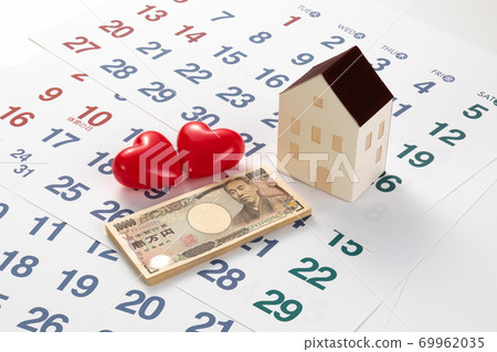 Image of money and house model Image of money and house model 69962035