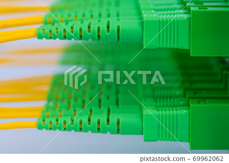 Fiber optic patch cord connected to distribution panel macro Fiber optic patch cord connected to distribution panel macro 69962062