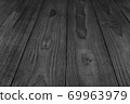 Old wooden plank background with selective focus.  69963979