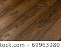 Old wooden plank background with selective focus. 69963980