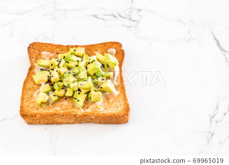 wholewheat bread toast with avocado wholewheat bread toast with avocado 69965019