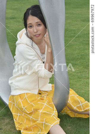 Mariko sitting Mariko sitting 69967972