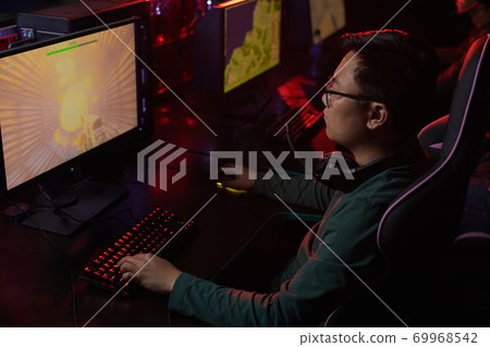 Gamer playing games on PC Gamer playing games on PC 69968542