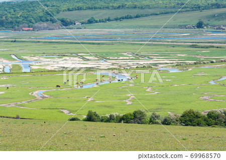 Cuckmere river near Seaford, East Sussex, England 69968570