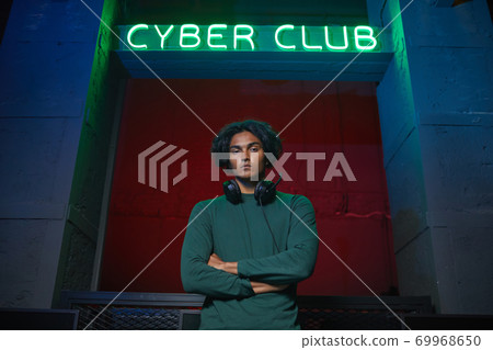 Man at cyber club 69968650