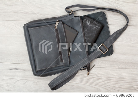 Leather shoulder bag for men with mobile phone and wallet on it 69969205