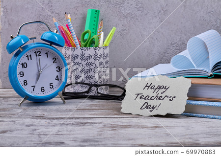 Composition of school items for happy teacher's day. Composition of school items for happy teacher's day. 69970883