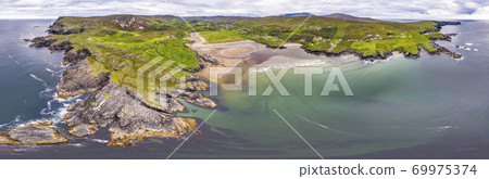 Aerial view of wild coast by Glencolumbkille in County Donegal, Irleand. Aerial view of wild coast by Glencolumbkille in County Donegal, Irleand. 69975374
