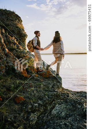 Walking along lake Walking along lake 69975431