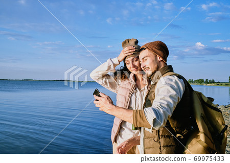 Taking selfie during hike Taking selfie during hike 69975433