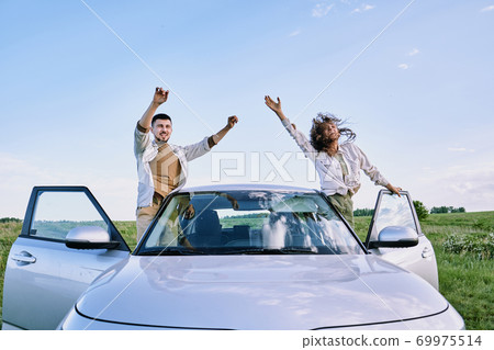 Couple greeting nature with cries of joy 69975514