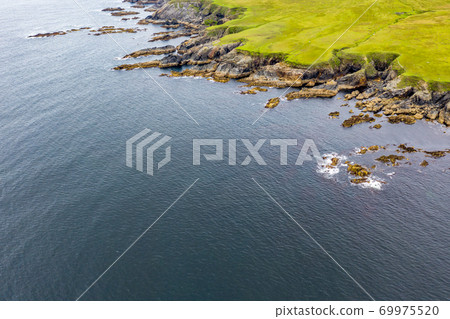 Aerial view of wild coast by Glencolumbkille in County Donegal, Irleand. Aerial view of wild coast by Glencolumbkille in County Donegal, Irleand. 69975520