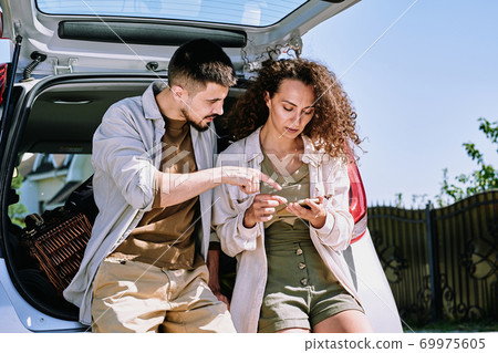 Checking hiking list before trip 69975605