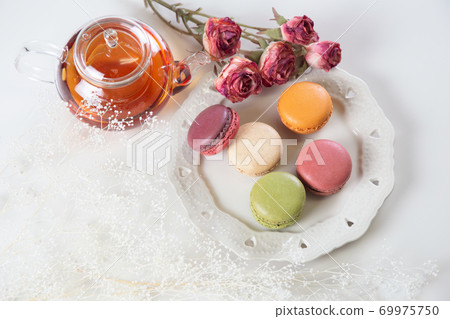 Image of tea time of macaroons and tea 69975750