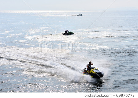 A water bike running on the Katase coast A water bike running on the Katase coast 69976772