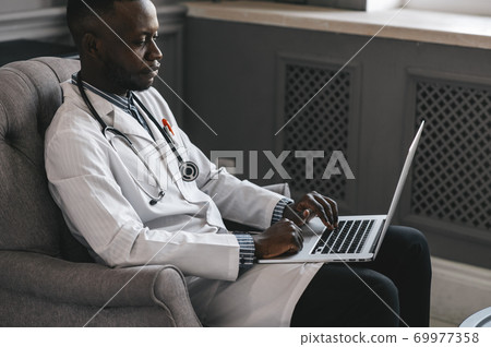 telehealth with virtual doctor appointment and online therapy session. Black doctor online conference  69977358
