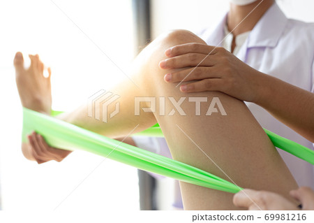 Professional therapists are stretching muscles, patients with abnormal muscular symptoms, physical rehabilitation therapies and treatment of physiological disorders by physiotherapists concept. 69981216