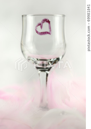 Standing glass with a red heart 69981841