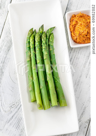 Boiled asparagus with romesco sauce Boiled asparagus with romesco sauce 69982882