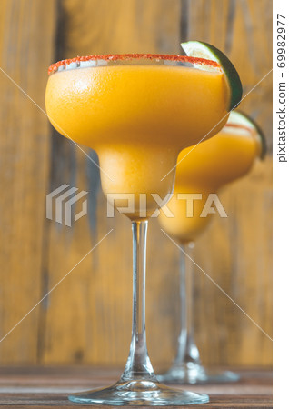 Frozen Mango Margarita cocktails 69982977