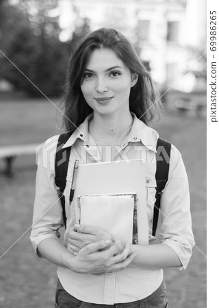 Young beautiful girl student in shirt. Black and white photo. BW 69986265