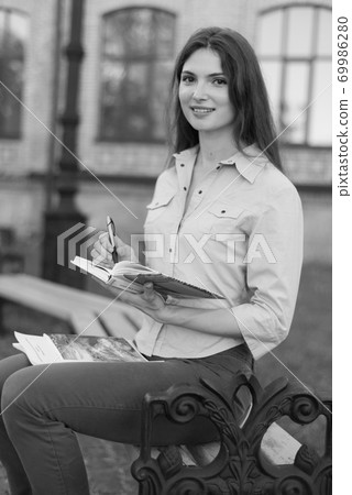 Young beautiful girl student in shirt. Black and white photo. BW 69986280