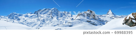 Panoramic beautiful view of snow mountain Matterhorn peak, Zermatt, Switzerland. Panoramic beautiful view of snow mountain Matterhorn peak, Zermatt, Switzerland. 69988395