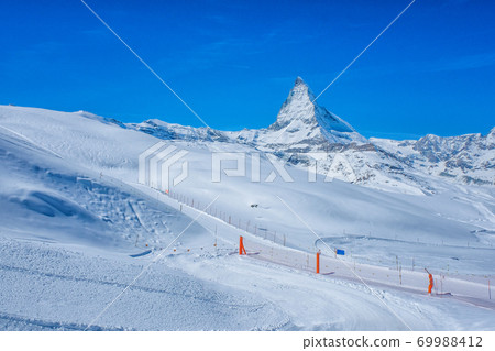 Panoramic beautiful view of snow mountain Matterhorn peak, Zermatt, Switzerland. 69988412