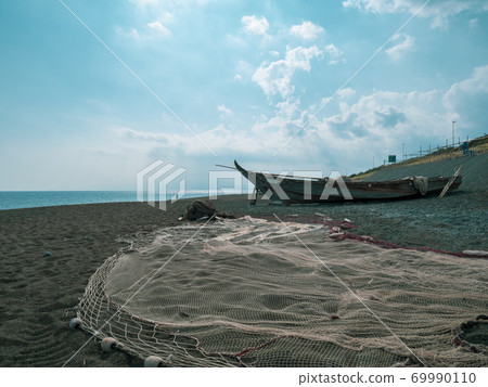 Calm autumn clear sea and fishing boat Oiso Town September 69990110