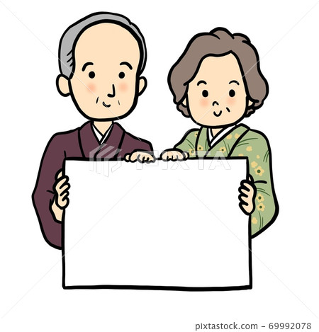 Senior couple with a message board Senior couple with a message board 69992078