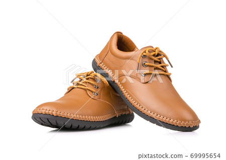 New brown men leather shoes. Studio shot isolated on white New brown men leather shoes. Studio shot isolated on white 69995654