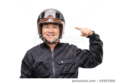 Motorcyclist or rider wearing vintage helmet. Safe ride campaign concept. Studio shot isolated on white Motorcyclist or rider wearing vintage helmet. Safe ride campaign concept. Studio shot isolated on white 69995966