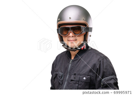 Motorcyclist or rider wearing vintage helmet. Safe ride campaign concept. Studio shot isolated on white Motorcyclist or rider wearing vintage helmet. Safe ride campaign concept. Studio shot isolated on white 69995971