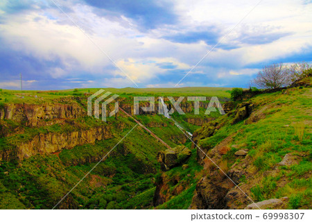 Panorama view to Kasagh gorge and river with waterfall near Hovhannavank monastery, Aragatsotn, Armenia Panorama view to Kasagh gorge and river with waterfall near Hovhannavank monastery, Aragatsotn, Armenia 69998307