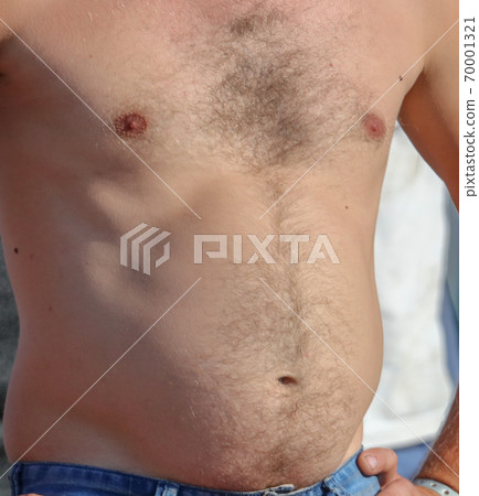 A man with a hairy chest and stomach as background A man with a hairy chest and stomach as background 70001321
