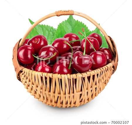 red sweet cherry in a wicker basket isolated on white background with clipping path and full depth of field 70002107