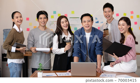 Group of Happy young business Startup coworkers working Brainstorming together to get ideas and marketing plan at office,Business Startup Diversity Concept Group of Happy young business Startup coworkers working Brainstorming together to get ideas and marketing plan at office,Business Startup Diversity Concept 70003415