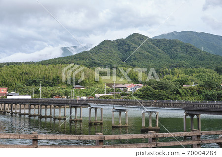 Old-fashioned old wooden bridge Old-fashioned old wooden bridge 70004283