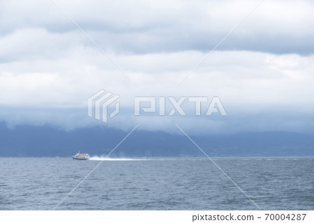 High-speed ship running in the sea High-speed ship running in the sea 70004287