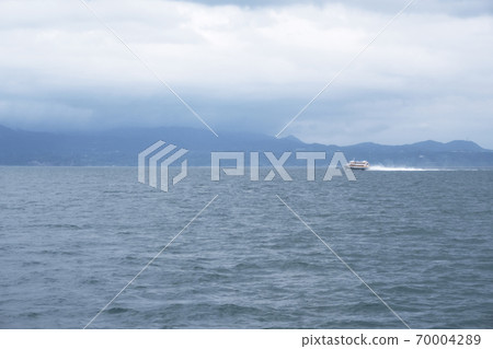 High-speed ship running in the sea High-speed ship running in the sea 70004289