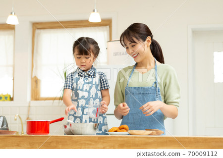 Moms enjoying making fun with their kids Moms enjoying making fun with their kids 70009112